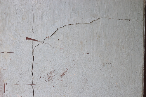 white wall with crack
